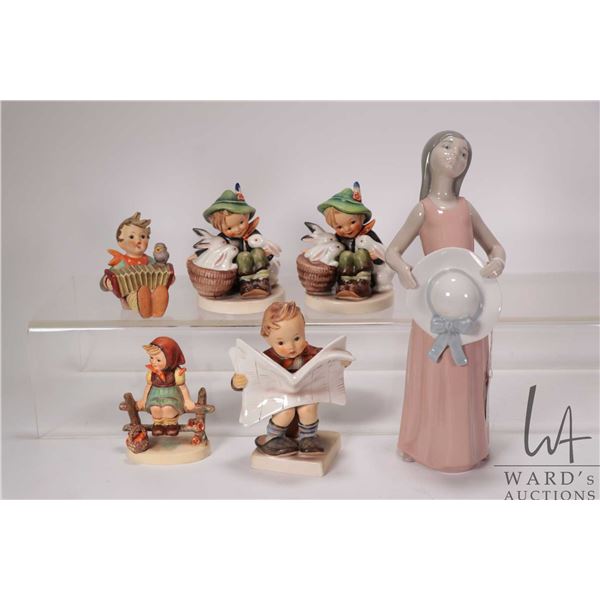 Tray lot of collectibles including five vintage Hummel figurines and 9 3/4" Lladro figurine "The Dre