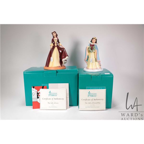Two Walt Disney porcelain figurines including 2003, 1 st release Holiday Princess Belle no. 1228652 