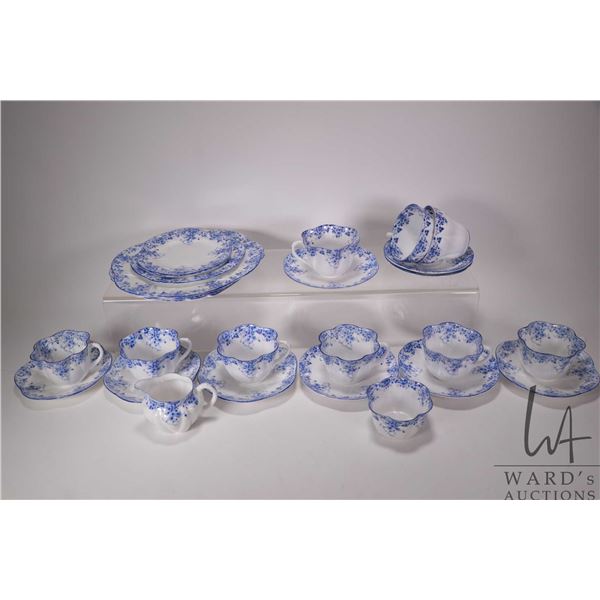 Selection of vintage Shelley "Dainty Blue" 051/28 bone china including seven cups and saucers, cream