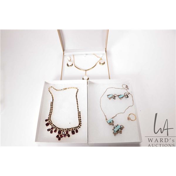 Selection of vintage and collectible costume jewellery including gold tone and ruby like gemstone ne