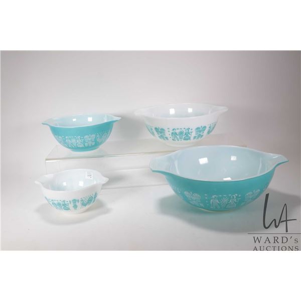 Vintage Pyrex blue and white graduated "Amish Butterprint" circa 1950 and a Titania noodle maker
