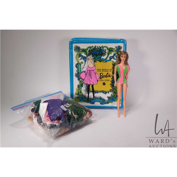 Vintage Barbie doll with side glancing eyes, Barbie case circa 1970's and a selection of Barbie clot