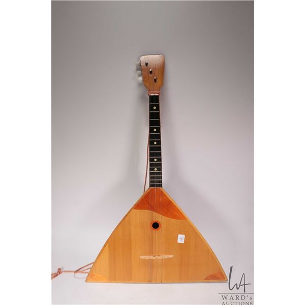 Russian Balalaika three string instrument with two toned wooden body