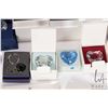 Image 8 : Large selection of Swarovski Crystal paperweights/ and plaques plus SCS gifts and polishing cloths e