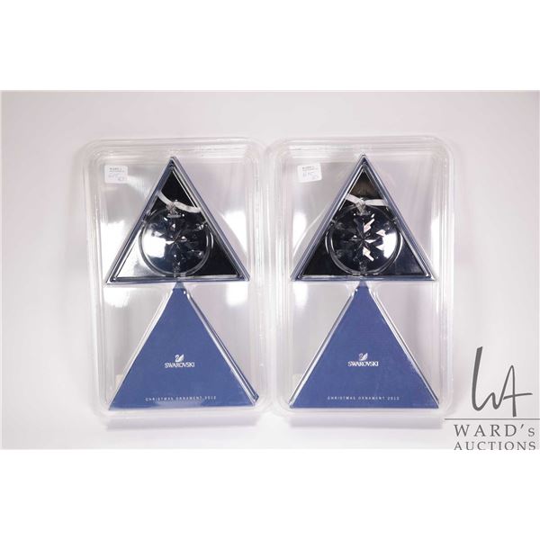 Two Swarovski Crystal snowflakes, both 2012