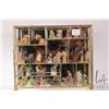 Image 1 : Brass and glass display with thirty five Wade Irish porcelain figures including Nursery Rhyme and an