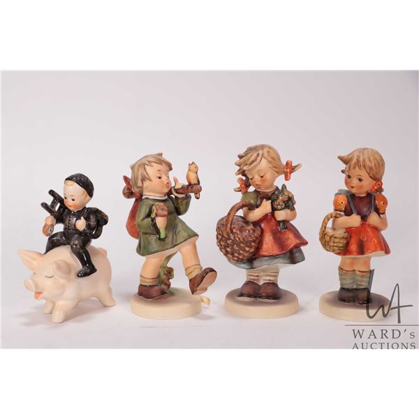 Four Hummel/ Goebel figurines including Autumn Harvest and Joyful Adventure etc.