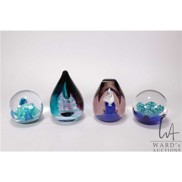 Four Caithness, Scotland numbered paperweights including "Jack in the box #771", "Floral Illusion #1