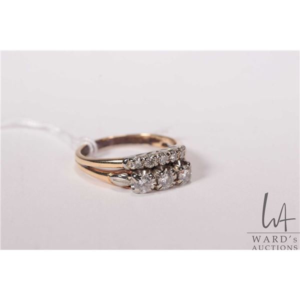 14kt yellow and white gold diamond wedding set including three stone engagement ring and and five st