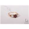 Image 1 : 10kt yellow gold ring set with two opal, oval cut garnet and six diamond accent gemstones, size 6.5
