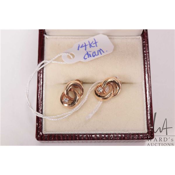 14kt yellow gold earring set with small accent diamonds
