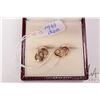 Image 1 : 14kt yellow gold earring set with small accent diamonds