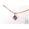 Image 1 : 14kt yellow gold Cuban link 21" necklace and a tested 14kt yellow gold and kite cut amethyst gemston