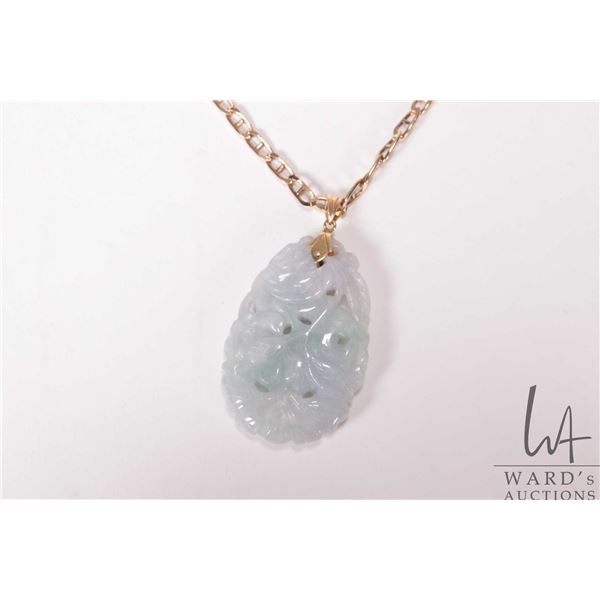 10kt yellow gold 17" neck chain and carved jade pendant