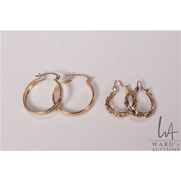 Two pair of 10kt yellow gold hoop earrings