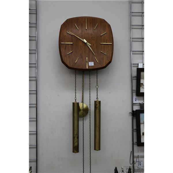 Mid-century Junghans German wall clock with wood case and brass components, working at time of catal