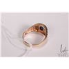 Image 3 : Gent's 10kt yellow gold ring set with synthetic blue star sapphire and .005cts of round single cut d