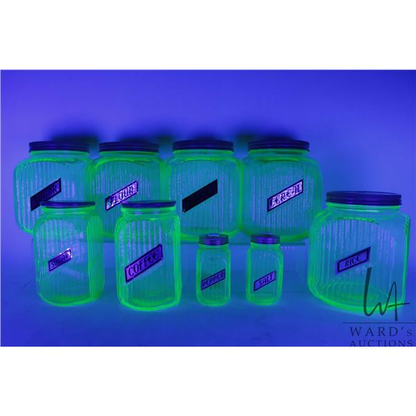 Nine piece Anchor Hocking green Uranium depression glass canister set, circa 1930 with seven ribbed 
