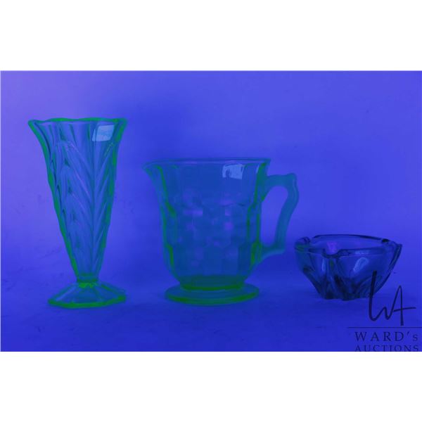 Three pieces of vintage Uranium glass including 8 1/2" spill vase, drinks pitcher and small lipped b