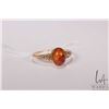 Image 1 : Tested 10kt gold ring set with cabochon amber stone, size 8