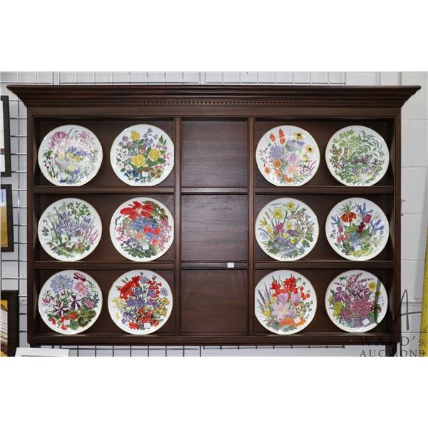 Wall mounted nine compartment display rack 46" H X 63" W
