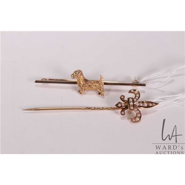Two vintage gold brooches including unmarked tested 9ct gold Scottish terrier bar brooch and a 14kt 