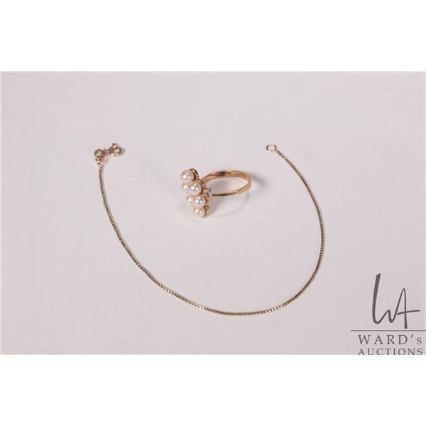 10kt yellow gold box chain 8" bracelet and a 14kt yellow gold ring set with six genuine pearls. Note
