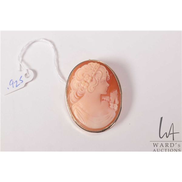 Vintage carved cameo brooch in gold washed marked .925 bezel with pendant bail