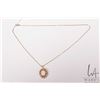 Image 2 : Tested 14kt yellow gold and opal pendant on 17" gold toned neck chain