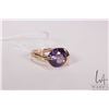 Image 1 : 10kt yellow gold ring set with purple gemstone that tests at sapphire, size 7.5