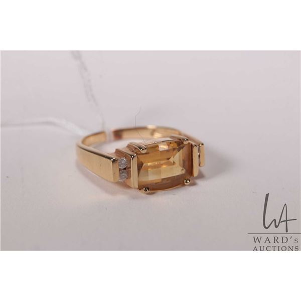 14kt yellow gold, citrine and diamond ring, set wiht oval faceted genuine citrine gemstone and 0.12c