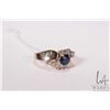 Image 1 : 14kt white gold, oval cut sapphire and round brilliant cut diamond cluster ring, size 8