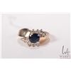 Image 2 : 14kt white gold, oval cut sapphire and round brilliant cut diamond cluster ring, size 8