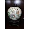 Image 1 : Chinese enameled porcelain ginger jar featuring and domestic garden scene, with black wooden lid and