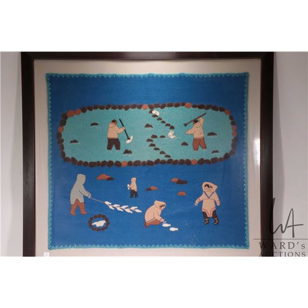 Inuit art hand made wool applique Kiluk featuring an ice fishing scene, overall dimensions including