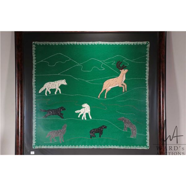 Inuit art hand made wool applique Kiluk featuring a wolf pack hunting a deer, overall dimensions inc