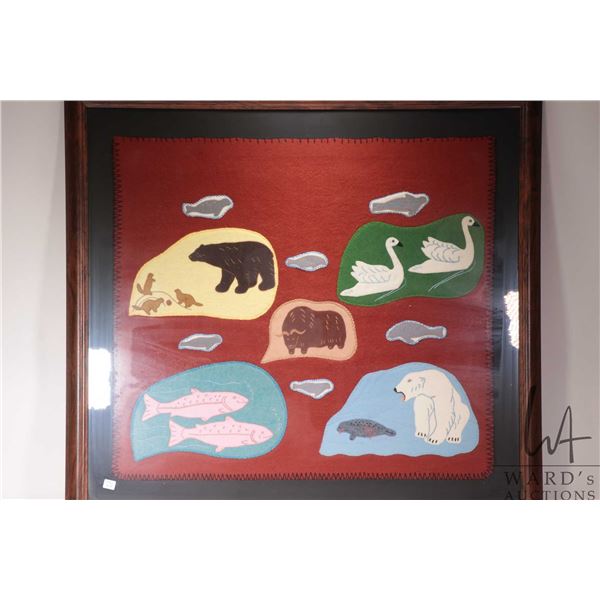 Inuit art hand made wool applique Kiluk featuring animals and birds, overall dimensions including fr