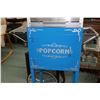 Image 2 : Fountain style popcorn maker machine, appears new with warming light, accessories and machine cart o