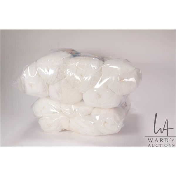Eleven 50 gram balls of Zellers Baby wool in white