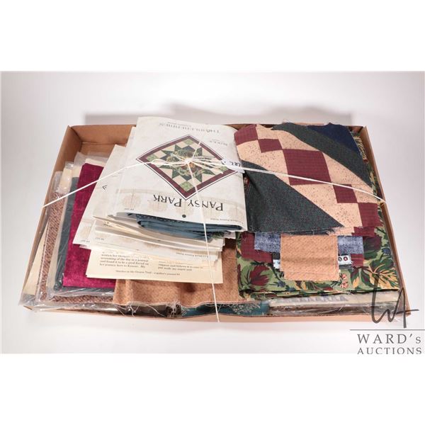 Tray lot containing a large selection of quilt blocks including patterns with fabric plus completed 
