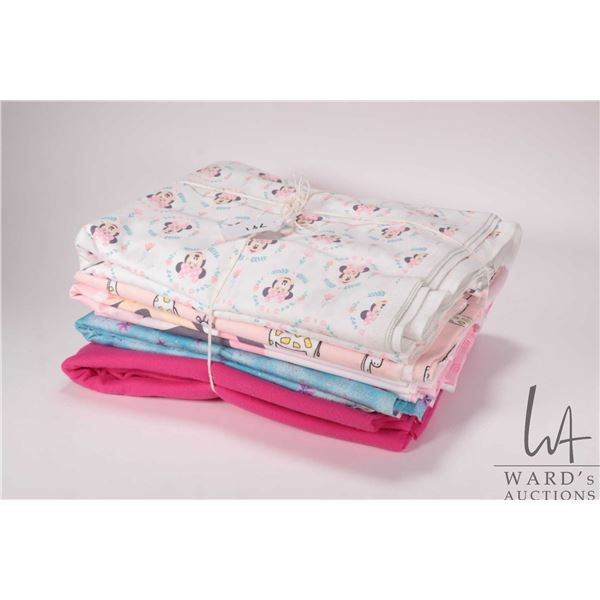 Selection of cotton and flannel quilting fabrics, yardage unknown