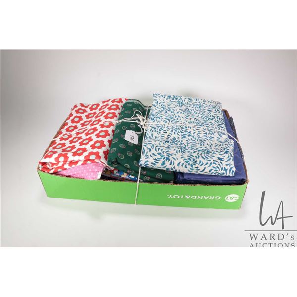 Tray lot containing a large selection of quality cotton quilt fabric, yardage unknown