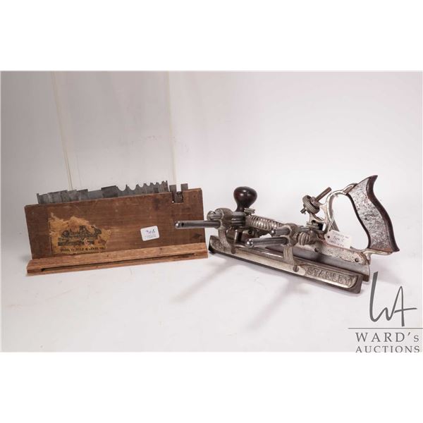 Antique Stanley #45 Type 5 plane circa 1893-1894, comes with original cutter box and 18 blades