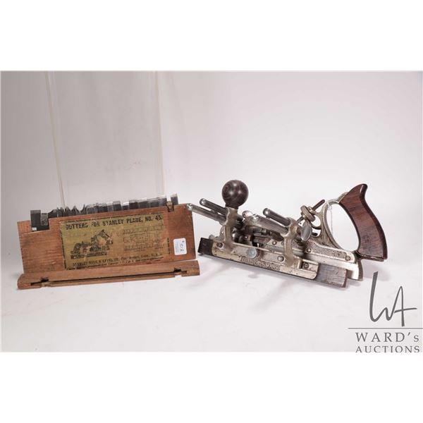 Antique Stanley #45 Type 7B circa 1901-1906, comes with original cutter box and 18 blades
