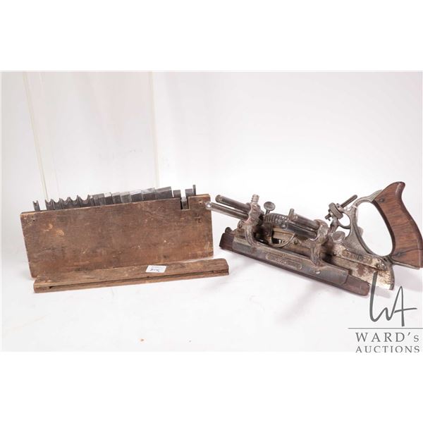 Antique Stanley #45 Type 9 plane circa 1908-1909, comes with original cutter box and 17 blades
