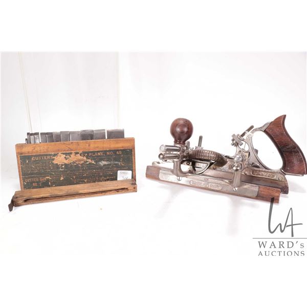 Antique Stanley #45 Type 10 plane circa 1909 with original cutter box No. 2 with 12 blades