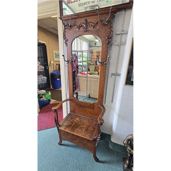 Antique quarter cut oak, Canadiana, flip seat hall stand with mirrored back and cast hooks
