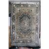 Image 1 : Soft sculpted wool carpet with overall grey hues, center medallion, floral design and highlights of 