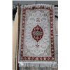 Image 1 : Small scatter rug with center medallion and muted tones, 29" X 48"