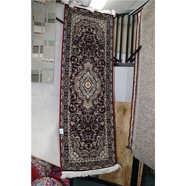 Modern polyester runner, in jewel tones of deep cranberry and highlights of cream, blue, green etc. 